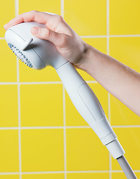 Handheld shower offers innovative palm feature