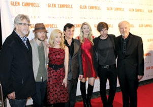 Producers of the documentary with Campbell family members.