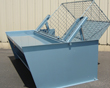 Automated lift tables safely remove linens from carts and trucks