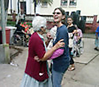 Liza dancing with a resident at a nursing home in Guatemala.