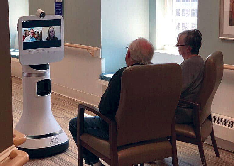 Robots move in to facilitate connections during crisis