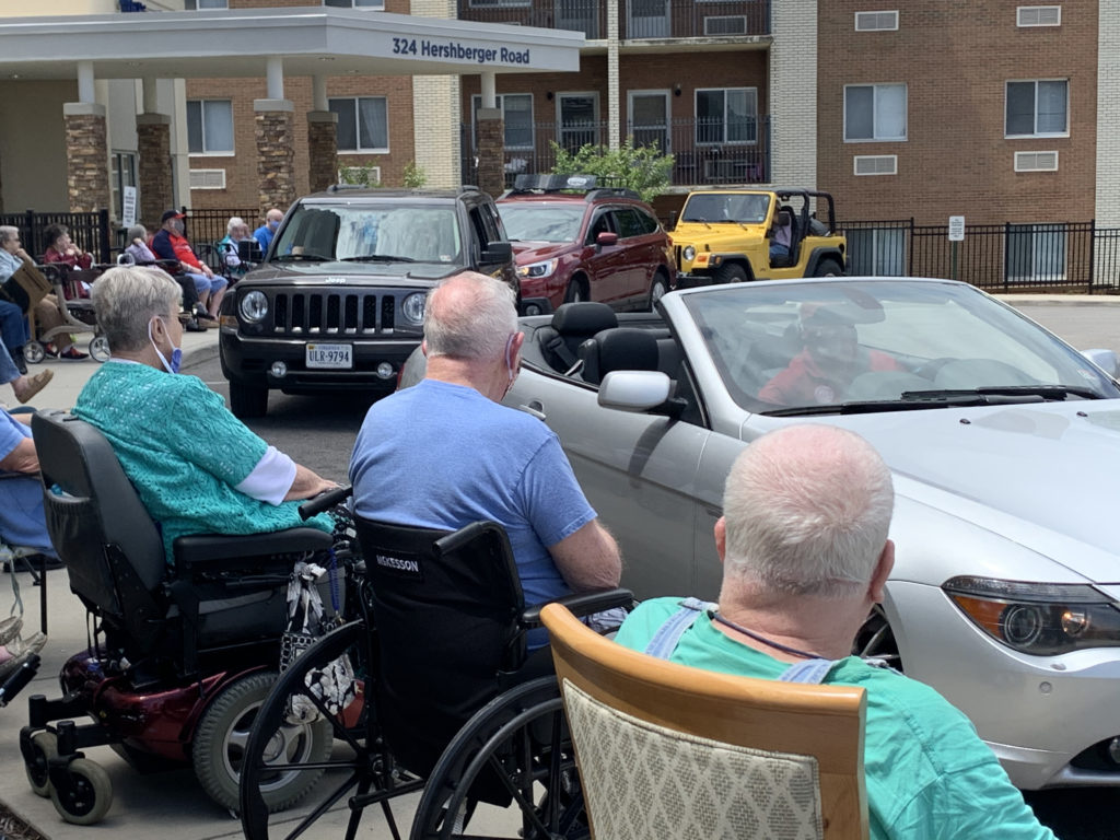 ‘Heartwarming’ Father’s Day parade connects residents and family members