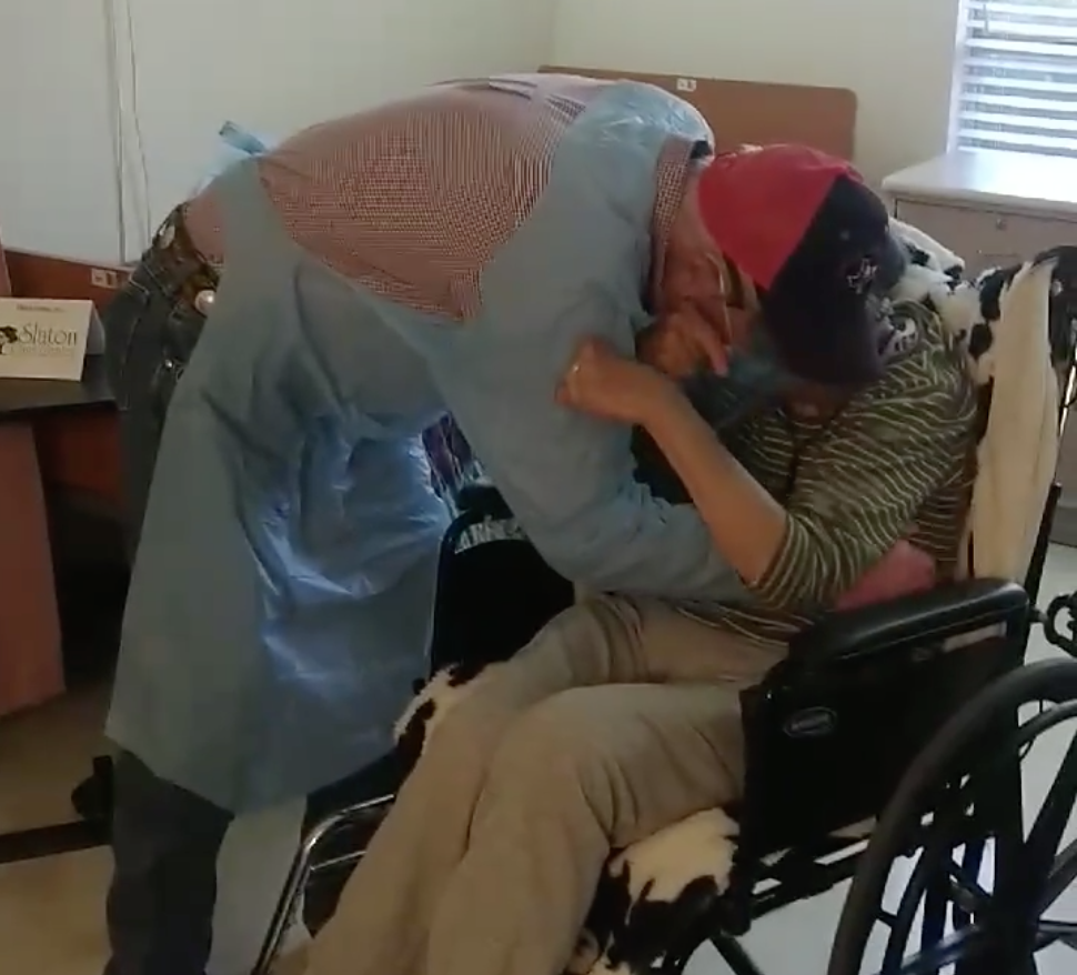 For husband and wife of 66 years, at long last, a hug