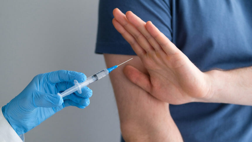 A nurse refusing a vaccine shot