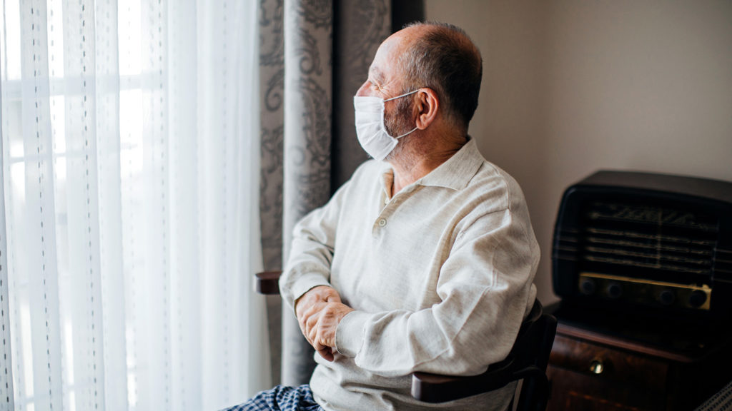 Senior man in isolation at home for virus outbreak