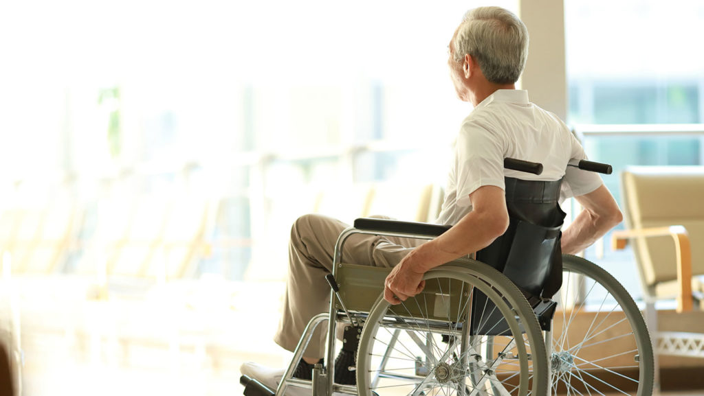 A senior sitting in a wheelchair