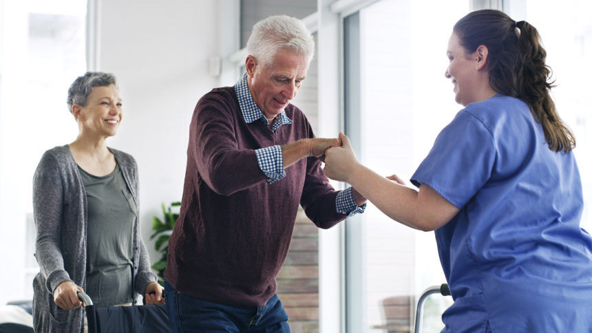 Post-acute care patient receiving support for standing, walking
