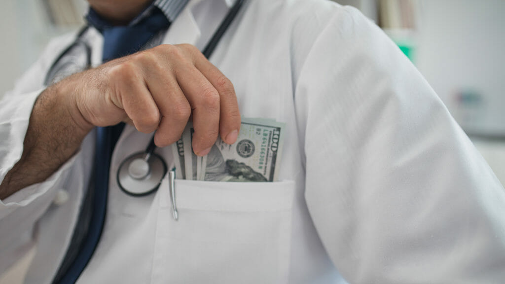 Congressional deal meets docs halfway on pay, extends telehealth flexibility