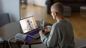 patient shown engaging in telehealth appointment
